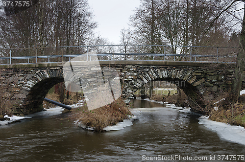 Image of old stonebridge over the cold water 