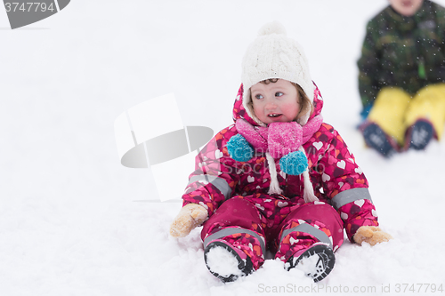 Image of little girl at snowy winter day