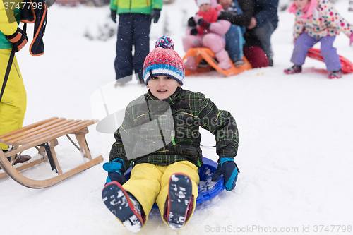 Image of little boy having fun on winter day