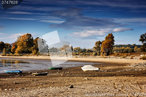 Image of Dried lake with some boats