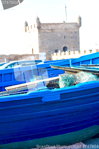 Image of boat   in morocco  old harbor wood    and  abstract pier