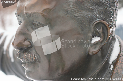 Image of men's bronze head profile
