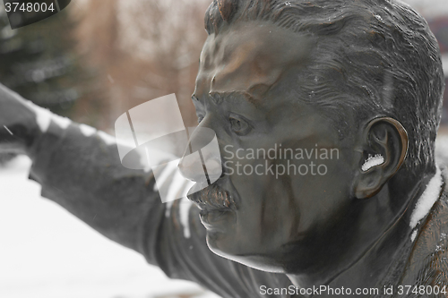 Image of men's bronze head profile