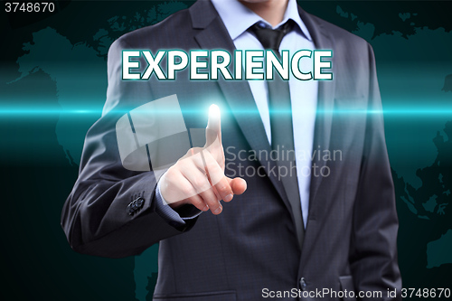 Image of business, internet and networking concept - businessman pressing experience button on virtual screens