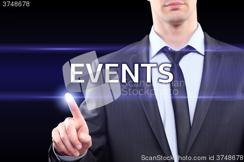 Image of business, technology and networking concept - businessman pressing events button on virtual screens