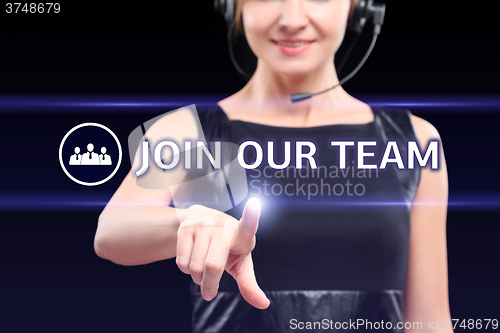 Image of businesswoman  ressing a Join Our Team concept button. 