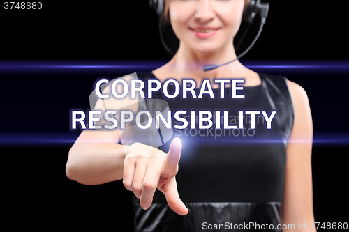 Image of business, technology and networking concept - businesswoman pressing corporate responsibility button on virtual screens