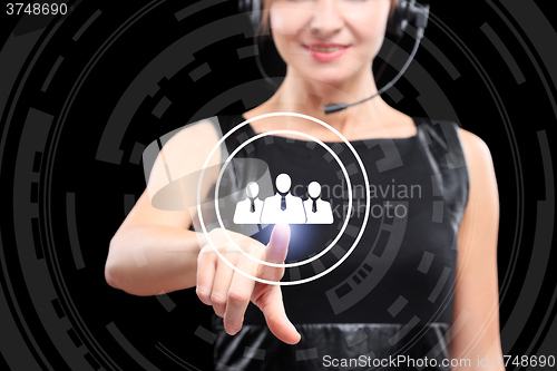 Image of business, technology and internet concept - businesswoman pressing sign matching people button on virtual screens