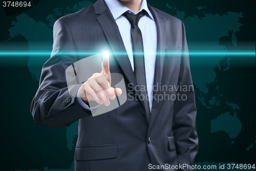 Image of business, technology, internet and networking concept - businessman pressing button with contact on virtual screens. World map