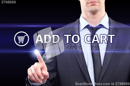 Image of business, technology  concept - businessman pressing add to cart button on virtual screens