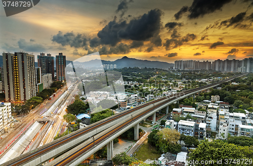 Image of hong kong urban downtown and sunset speed train, Long Ping