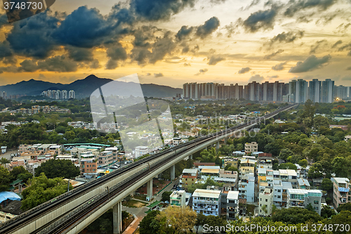 Image of hong kong urban downtown and sunset speed train, Long Ping