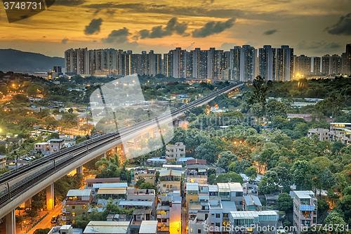 Image of hong kong urban downtown and sunset speed train, Long Ping