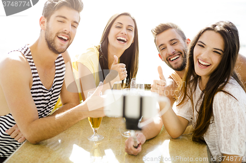 Image of Group selfie at the beach bar