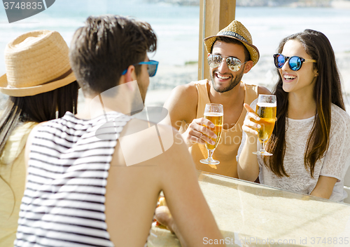 Image of Friends at the beach bar