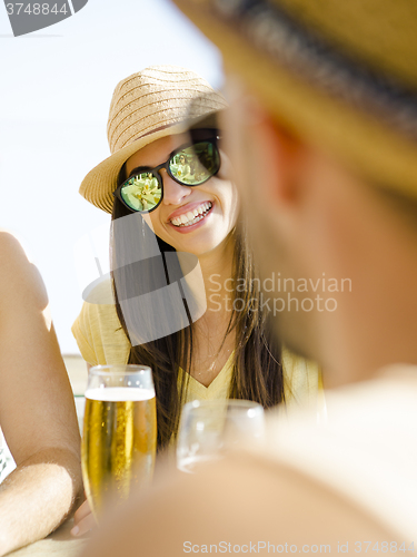 Image of Friends at the beach bar