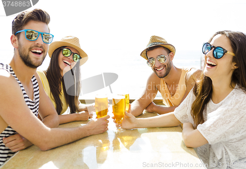 Image of Friends at the beach bar