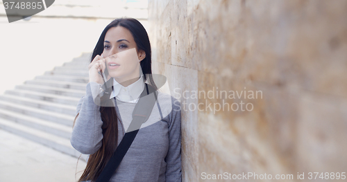 Image of Woman on phone with atonished expression