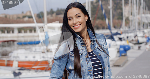 Image of Fun attractive woman smiling at the camera