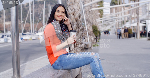 Image of Pretty stylish young woman in colorful fashion