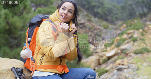 Image of Athletic young female backpacker