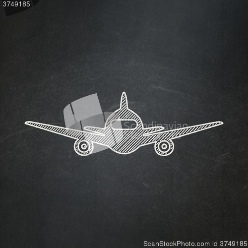 Image of Vacation concept: Aircraft on chalkboard background