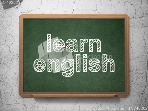 Image of Studying concept: Learn English on chalkboard background