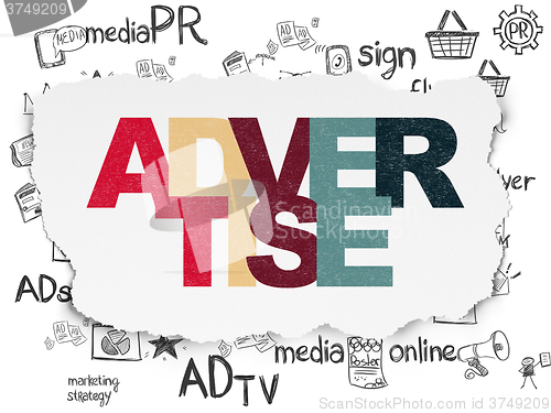 Image of Marketing concept: Advertise on Torn Paper background