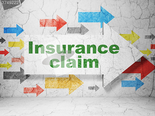 Image of Insurance concept: arrow with Insurance Claim on grunge wall background