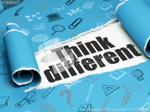 Image of Studying concept: black text Think Different under the piece of  torn paper