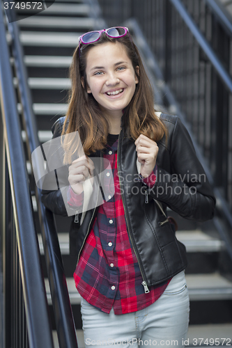 Image of Portrait of Pretty Young Female Student With Backpack