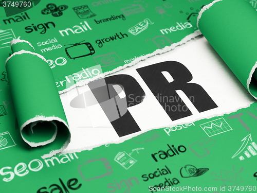 Image of Advertising concept: black text PR under the piece of  torn paper
