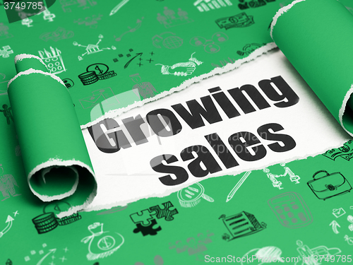 Image of Business concept: black text Growing Sales under the piece of  torn paper