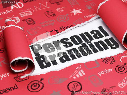 Image of Marketing concept: black text Personal Branding under the piece of  torn paper