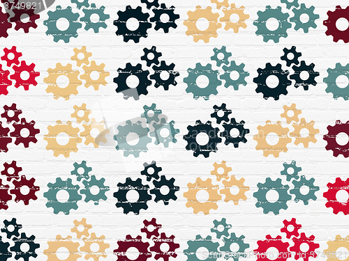 Image of Data concept: Gears icons on wall background