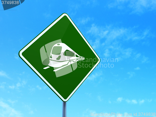 Image of Vacation concept: Train on road sign background