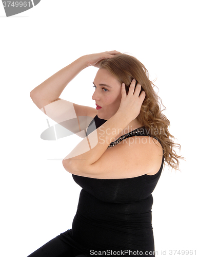 Image of Young woman in profile closeup.