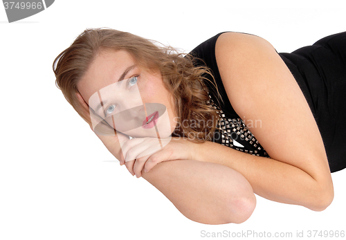 Image of Woman lying on floor.