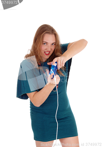 Image of Woman eager to play video game.