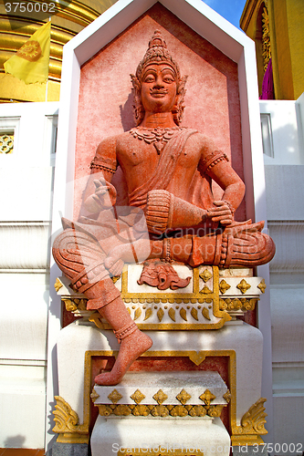 Image of siddharta   in the temple pink     wat  palaces   
