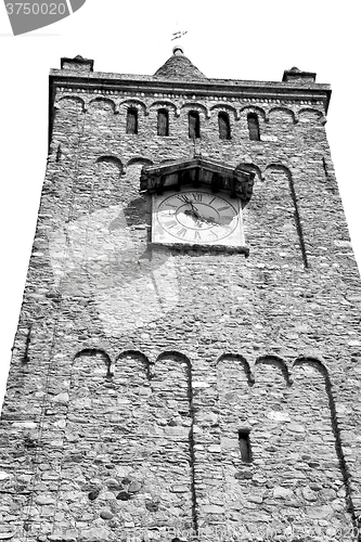 Image of ancien clock tower in italy europe old  stone and bell