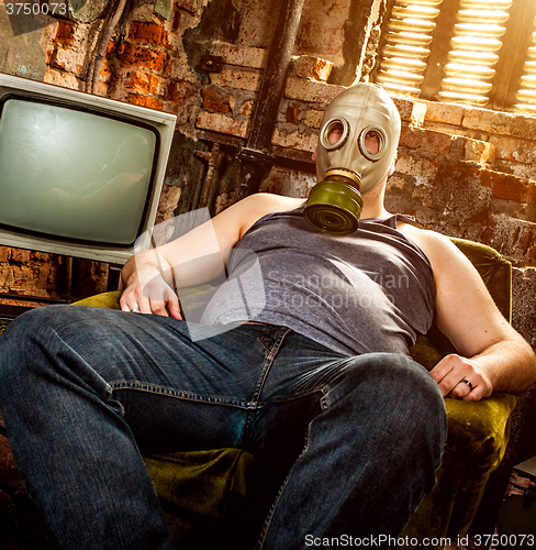 Image of man in a gas mask