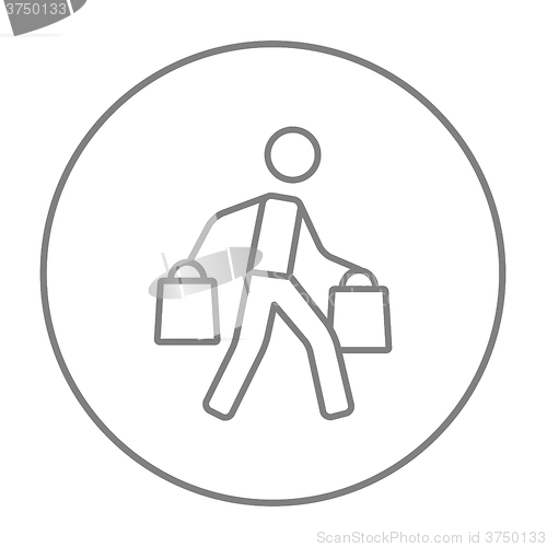 Image of Man carrying shopping bags line icon.