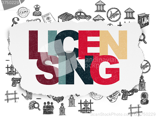 Image of Law concept: Licensing on Torn Paper background