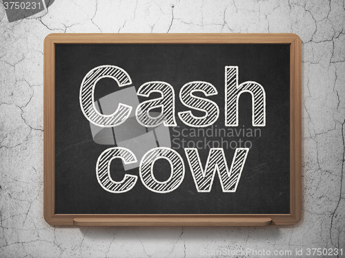 Image of Finance concept: Cash Cow on chalkboard background