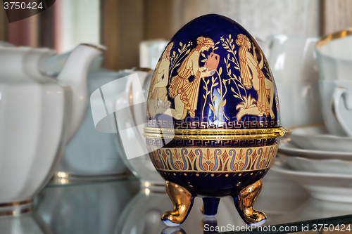 Image of Casket in the form of an Easter egg with an ornament.