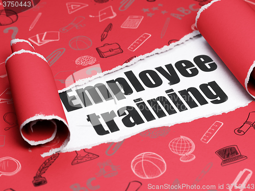 Image of Studying concept: black text Employee Training under the piece of  torn paper