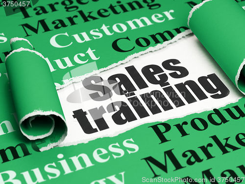 Image of Marketing concept: black text Sales Training under the piece of  torn paper