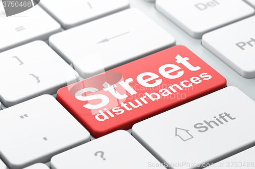 Image of Politics concept: Street Disturbances on computer keyboard background