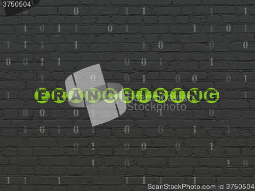 Image of Finance concept: Franchising on wall background